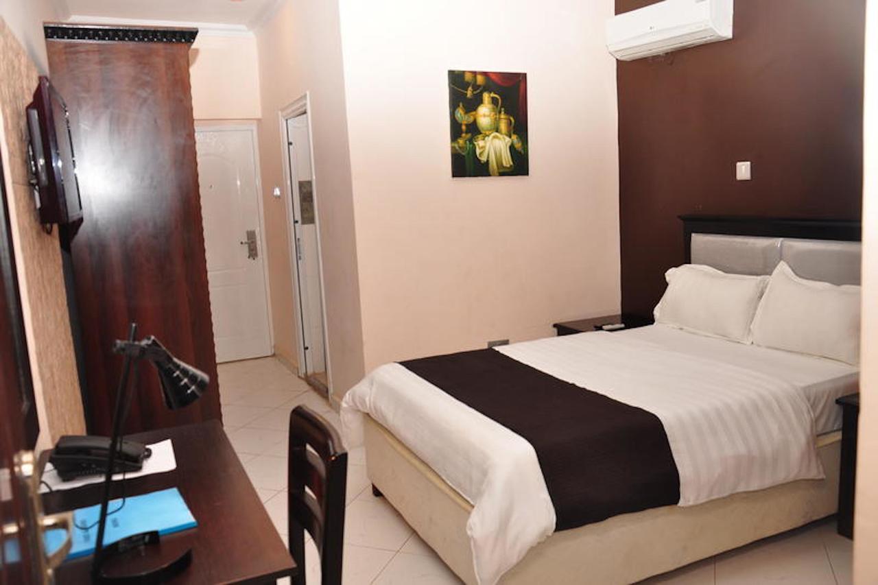 Grand Bank Link Hotel Otta Экстерьер фото