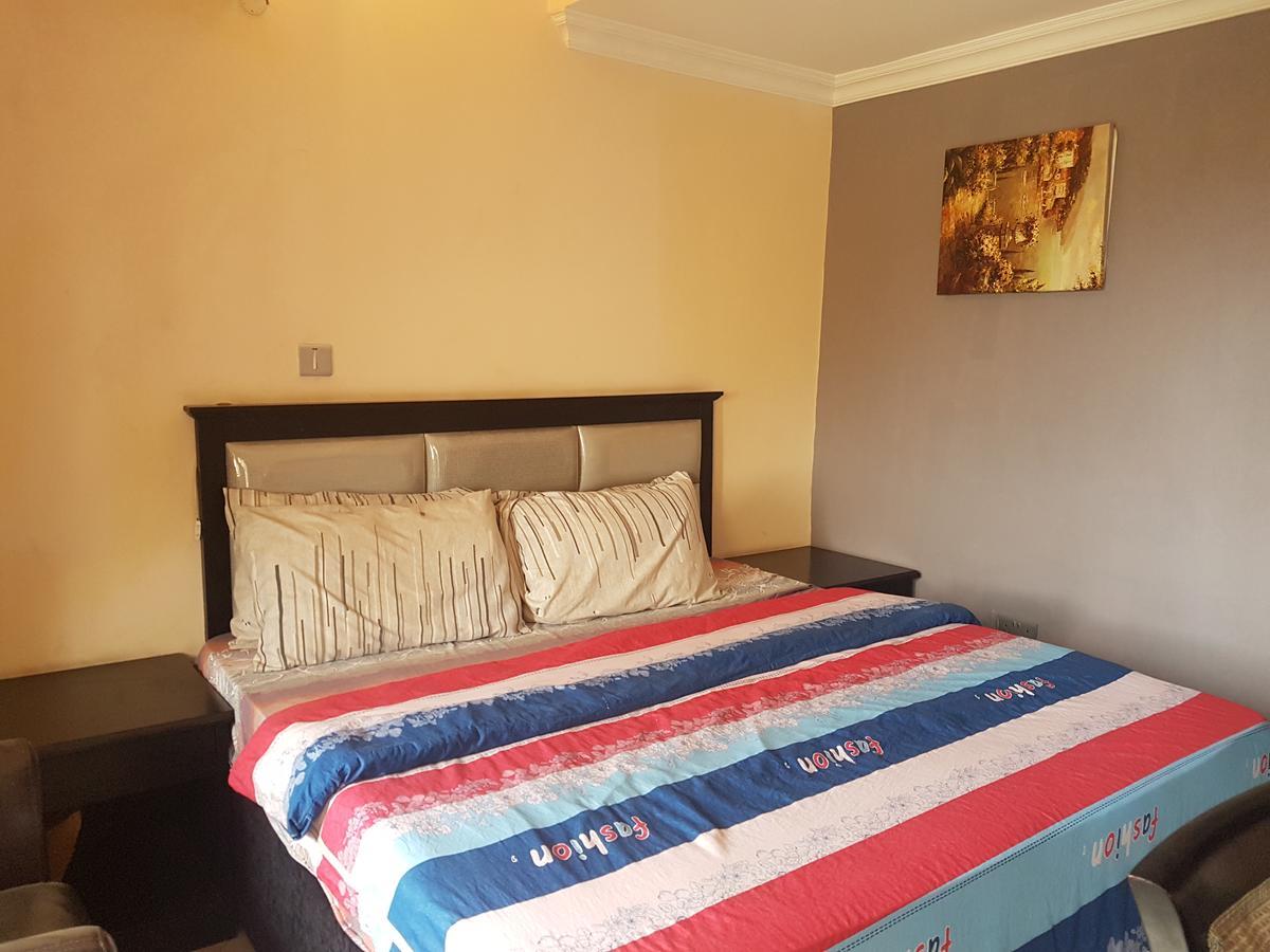 Grand Bank Link Hotel Otta Экстерьер фото